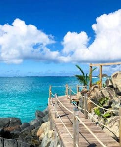 While staying at The Hills Residence vacation rentals in Sint Maarten, make sure to visit the stunning Little Bay Beach. With its crystal-clear waters and picturesque surroundings, it's the perfect place to relax and soak up the sun.